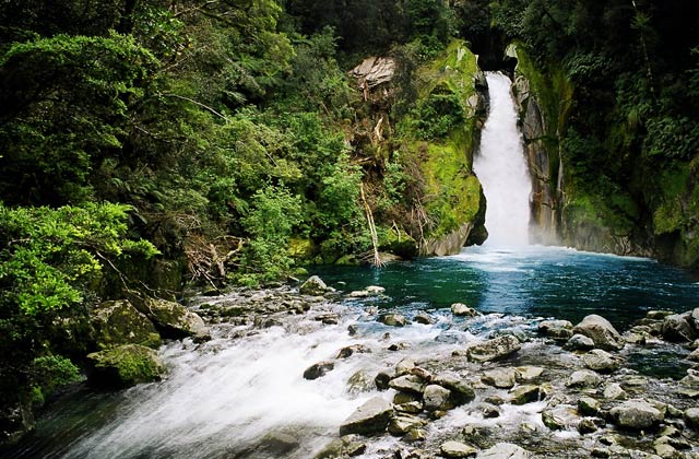 Beautiful waterfalls on the Milford Track | by Flight Centre's Tiffany Apatu