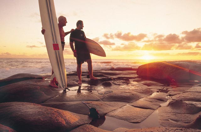 Surfers admiring the waves